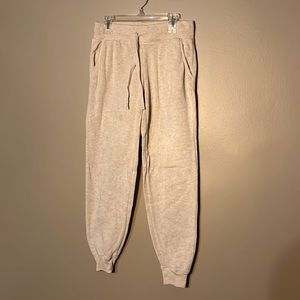 Cream colored sweat pants in great condition.